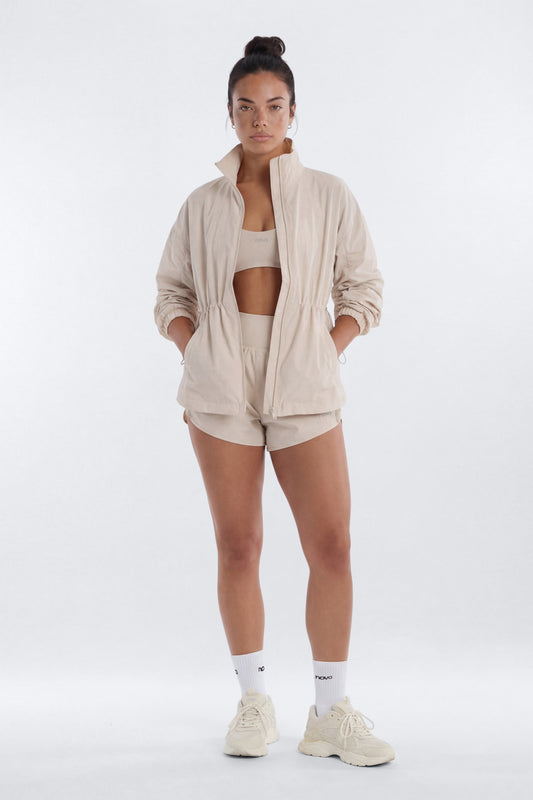 CoreNylon Ruched Mock Neck Jacket - Oat Milk Fashion Nova
